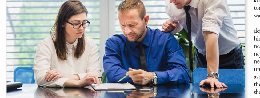 Kinsey Investigations Why Your Should Hire a Private Investigator - Two men and a woman look down at documents on a conference table.