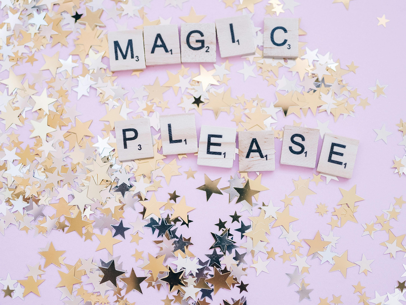 KinseyInvestigations.com What Private Investigators Don't Do - Letter tiles spelling the words Magic Please sit on top of glitter pieces.