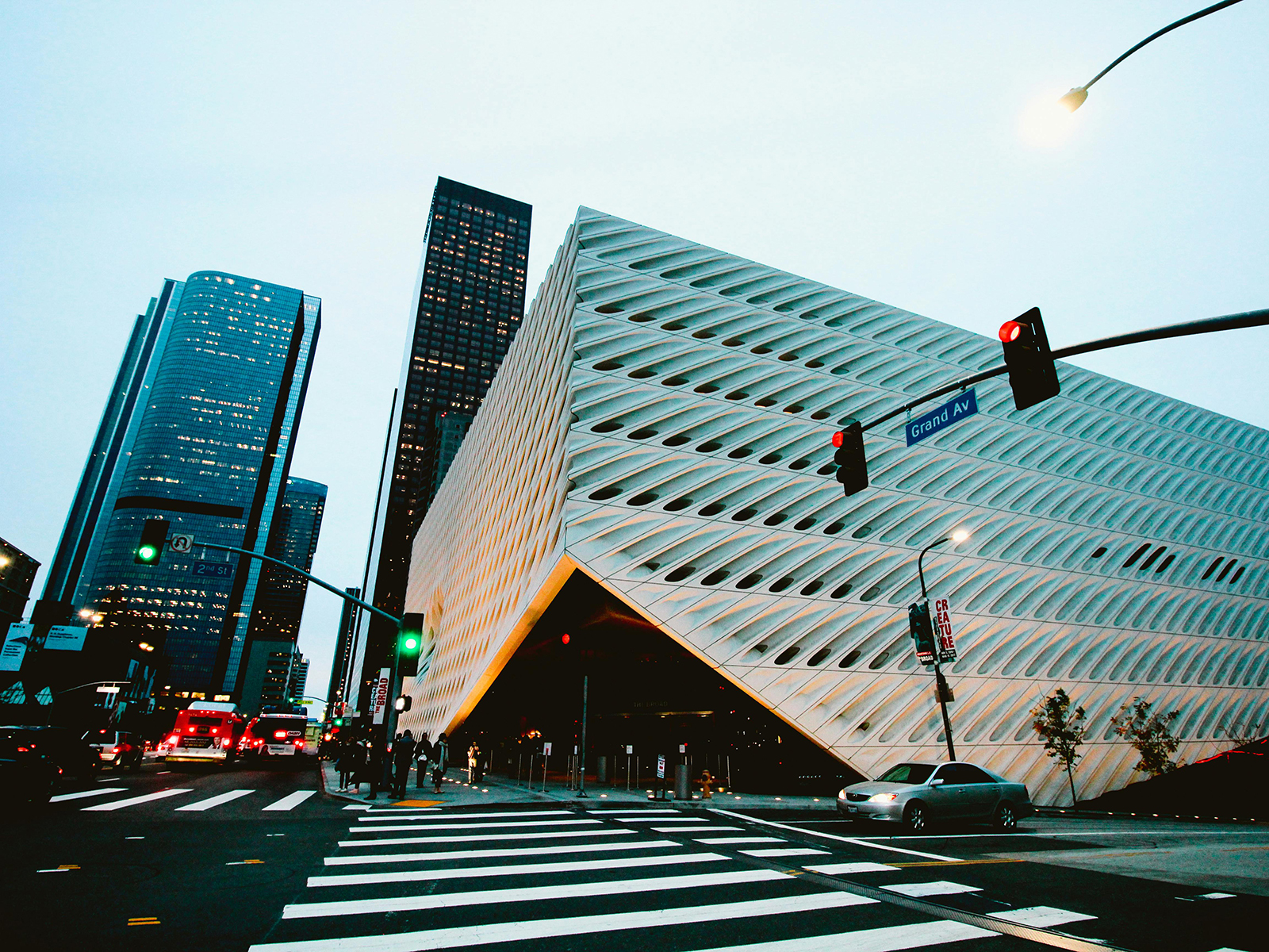 KinseyInvestigations.com Corporate Security Investigations - City buildings and sky scrapers tower over concrete steps.