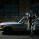 Investigator with flashlight - Contact Kinsey Investigations.